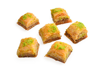 Pistachio baklava on a white background. Dessert.