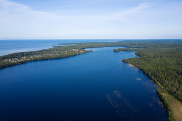 Fototapeta na wymiar Aerial view from drone on summer forest and lake
