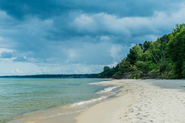 Beautiful scenery, seascape. Clear water and sand beach in the summertime. In Österlen, Sweden