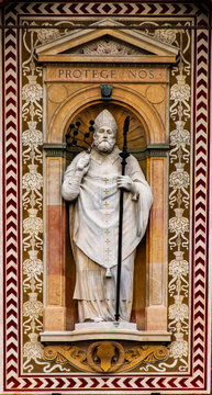 Statue of Saint Ambrose at Torre del Filarete of Sforza's castle in Milan, Italy