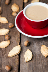 cup of coffee and leaf shape cookies