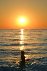 silhouette of a woman on sunset