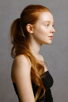young woman with red hair