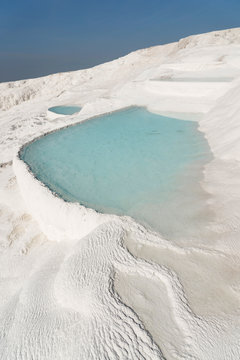 Steamy spring water in limestone