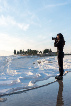 Photographer shooting limestone hills
