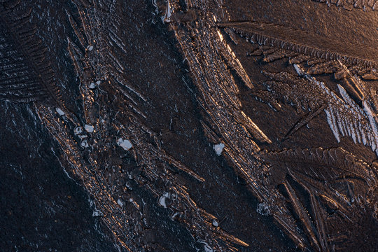Frozen ice on stone background