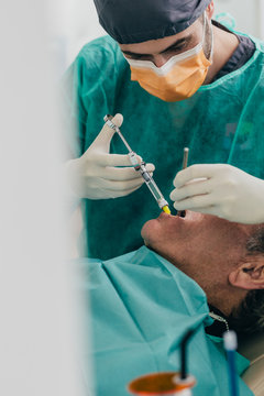 Dentist working on patient