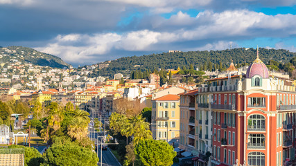 Fototapeta premium Nice, aerial view of the old town, on the French Riviera, with the mountains in background 