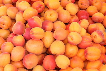 background of ripe orange apricots