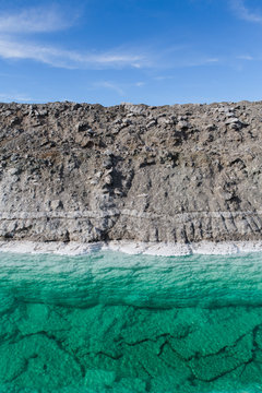 Calcium chloride mine tailings and canal in desert