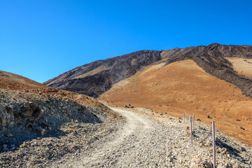 Beautiful Country roads and nature. Teide in the middle of the road.