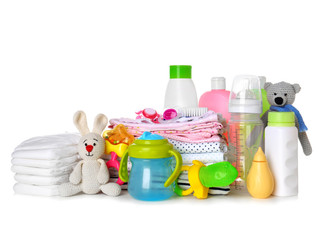 Set of baby accessories on white background
