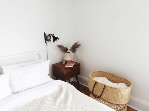 Woven Basket Newborn Bassinet Beside Bed