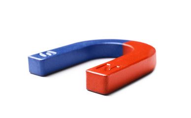 Red and blue horseshoe magnet on white background