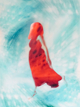 Creative cell phone - woman heavily edited with blue background