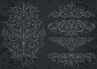 Graphic ornaments on chalkboard background - vector set