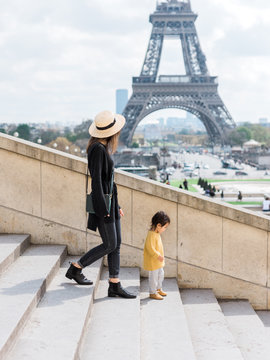 Mom and baby in front of Eiffel Tower
