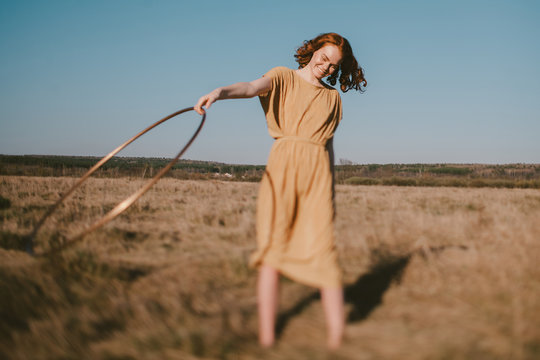 Summer and sunny portrait of happy ginger model