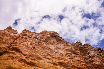 Fototapeta premium Cliffs of Caraúbas Beach in RN. Blue sky with clouds