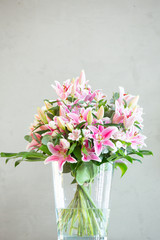 Pink lily flowers bouquet background