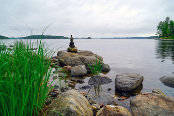 A small pyramid of stones on the shore of lake Ladoga.