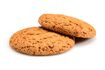 Homemade cookies. Two sweet cookie made from oatmeal flour. Tasty biscuit in high resolution close up isolated on white background. Homemade bakery.