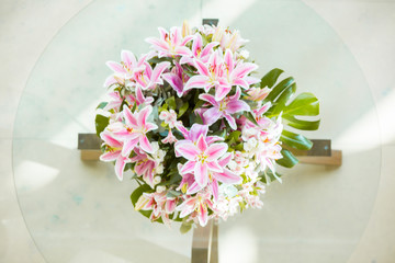 Pink lily flowers bouquet background