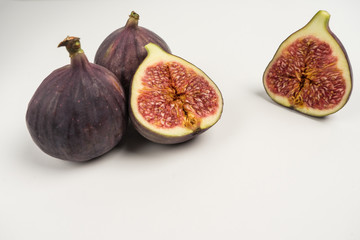 Ripe and beautiful figs on a white background. also in the context