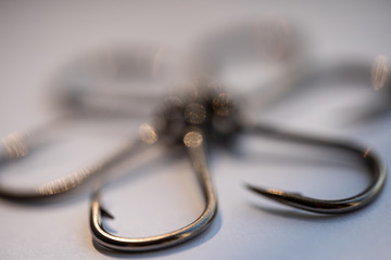 Sharp big fishing hooks on a white background