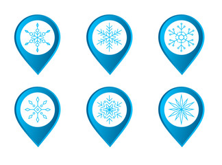 Set of map pointers with snowflakes