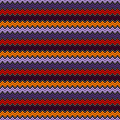 Seamless pattern in Halloween traditional colors. Classic geometric ornament. Zigzag horizontal lines wallpaper.
