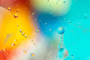 Abstract background, colorful gradient colors. Oil drops in water.