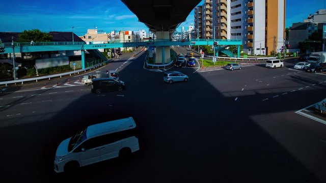 A timelapse of downtown street at Kanpachi avenue in Tokyo daytime wide shot panning