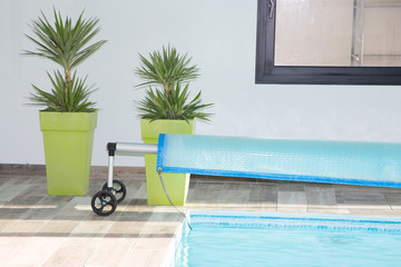 Fototapeta na wymiar pool cover bubble solar equipment for hot water in summer