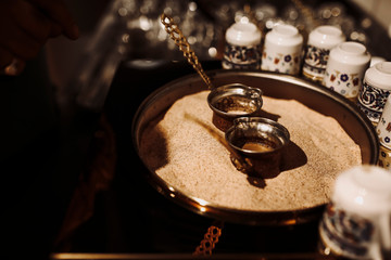 Turkish coffee is cooked in the sand.traditional turkish coffee. ottoman coffee