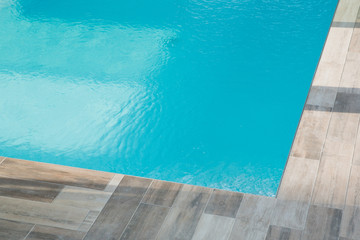 Detail of modern blue outdoor swimming pool