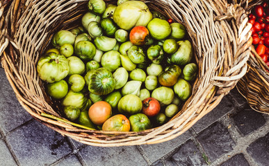 vegetables and fruit in a wicker basket at market