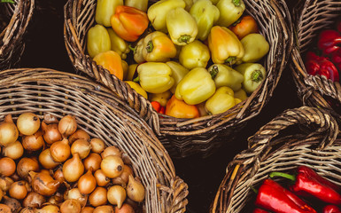 vegetables and fruit in a wicker basket at market
