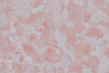 Fototapeta premium Texture of limestone an old worn out floor. Red surface background of porous stone. Texture surface sandstone.