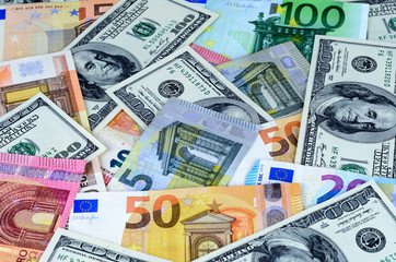 Obraz na płótnie Canvas Background with USA dollar andEuropean currency euro notes. Money texture