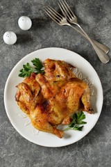 Spatchcocked barbecue chicken with spices and garlic