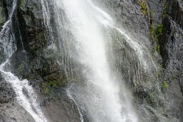High Waterfall on a Mountain Range
