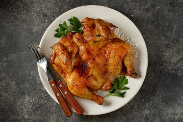 Spatchcocked barbecue chicken with spices and garlic