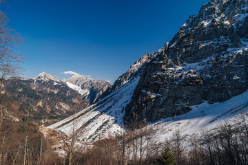 Winter or spring alpine mountain landscape of Karawanken alps, Slovenia. Snow slopes and high mountains of Slovenia, Europe.
