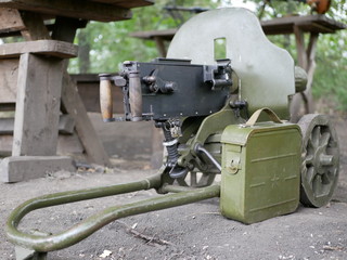 Maxim machine gun.  Water cooling of the barrel. box for machine gun ammunition. weapons of the second world war. Green camouflage.