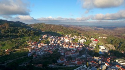 Aerial. Old historic village in mountains of southern Portugal, Monchique. Video Shooting from sky with a drone.