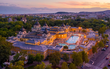 A public bath in budapest with sunset and amazing lights