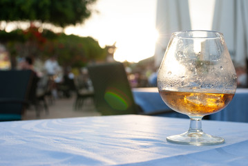 palm honey rum and ice in a glass