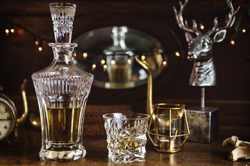 Crystal decanter and glass of whiskey