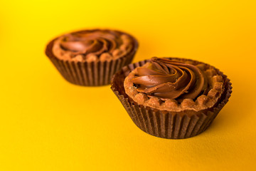 italian nougat pralines yellow background
